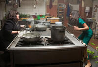 Melissa McCarthy and Nargis Fakhri in "Spy."