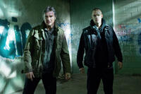 Liam Neeson as Jimmy Conlon and Joel Kinnaman as Mike in "Run All Night."