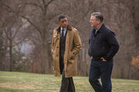Will Smith as Dr. Bennet Omalu and Alec Baldwin as Dr. Julian Bailes in "Concussion."