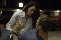 Natalie Martinez as Madeline and Ryan Reynolds as Young Damian in "Self/less."
