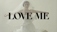 A still from "Love Me."