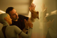 Alicia Vikander and director Alex Garland on the set of "Ex Machina."