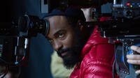 Cinematographer Bradford Young on the set of "Pawn Sacrifice."