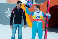 Taron Egerton as Eddie Edwards and Hugh Jackman as Bronson Peary in "Eddie the Eagle."
