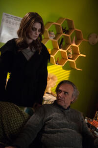 Ashley Greene as Evelyn and director Joe Dante on the set of "Burying the Ex."