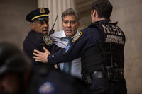 Giancarlo Esposito as Captain Marcus Powell, George Clooney as Lee Gates in "Money Monster."