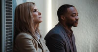 Sandra Bullock as Jane and Anthony Mackie as Ben in "Our Brand Is Crisis."