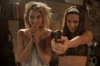 Ana de Armas as Bel and Lorenza Izzo as Genesis in "Knock Knock."