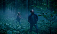 Natalie Dormer as Sara and Taylor Kinney as Aiden in "The Forest."