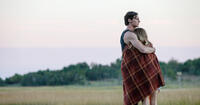 Benjamin Walker as Travis Parker and Teresa Palmer as Gabby Holland in "The Choice."