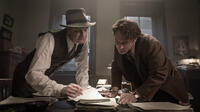 Colin Firth as Max Perkins and Jude Law as Thomas Wolfe in "Genius."