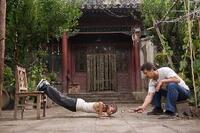 Jaden Smith as Dre Parker and Jackie Chan as Mr. Han in "The Karate Kid (2010)."