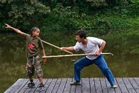 Jaden Smith as Dre Parker and Jackie Chan as Mr. Han in "The Karate Kid (2010)."