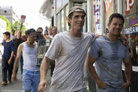 Christian Bale as Dickie Eklund and Mark Wahlberg as Micky Ward in "The Fighter."
