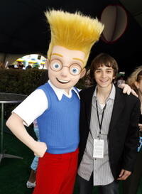 Actor Daniel Hansen and his character, Lewis, at the after party of the L.A. premiere of "Meet the Robinsons."