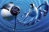 Gloria (voice of Brittany Murphy) and Mumble (voice of Elijah Wood) explore the ocean for the first time in "Happy Feet."