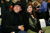 "Next" star Nicolas Cage and singer Kelly Clarkson at the NASCAR Nextel Cup Series Daytona 500.