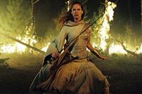 The warrior Arya (Sienna Guillory) faces a deadly enemy in "Eragon."