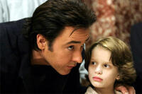John Cusack and Bobby Coleman in "Martian Child."