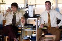 Matthew McConaughey and Matthew Fox study game film in "We Are Marshall."