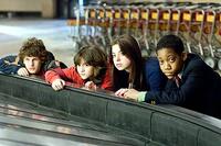 Dyllan Christopher, Quinn Shephard, Gina Mantegna, and Tyler James Williams in "Unaccompanied Minors."