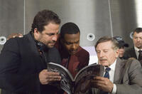 Director Brett Ratner, Chris Tucker and director Roman Polanski on the set of "Rush Hour 3."