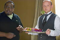 Cedric the Entertainer and Robert Clarke in "Code Name: The Cleaner."