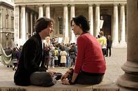 Brian (James McAvoy) pulls Rebecca (Rebecca Hall) out of a protest to speak with her in "Starter for 10."