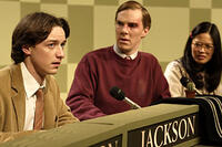 Patrick (Benedict Cumberbatch) and Lucy (Elaine Tan) give Brian (James McAvoy) a look of disgust after the answer he gives on a quiz show in "Starter for 10."