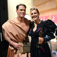 
	John Cena and Holly Waddington
