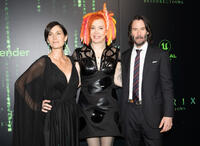 
	Carrie-Anne Moss, Lana Wachowski and Keanu Reeves
