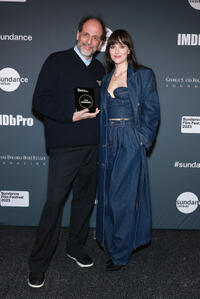 
	Luca Guadagnino and Dakota Johnson
