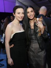 
	Mikey Madison and Demi Moore

