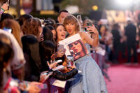 
	Taylor Swift and fans
