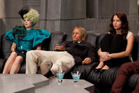 Effie Trinket (Elizabeth Banks), Haymitch Abernathy (Woody Harrelson) and Katniss Everdeen (Jennifer Lawrence).