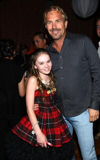 Madeline Carroll and Kevin Costner at the world premiere of "Swing Vote."