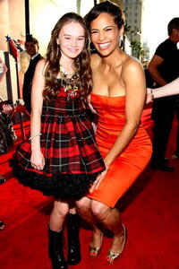 Madeline Carroll and Paula Patton at the world premiere of "Swing Vote."