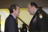 Peter Capaldi as Malcolm and James Gandolfini as General Miller in "In the Loop."