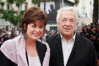 Jean-Pierre Cassel and guest at the screening of "The wind that shakes the barley" at the 59th edition of the International Cannes Film Festival.