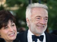 Jean-Pierre Cassel and his wife at the palais des festivals at the screening of "Cet amour-la" during the 56th Cannes film Festival.