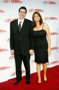 Adam Carolla and Lynette Paradise at the 33rd AFI Life Achievement Award tribute to George Lucas.