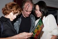 Keith Carradine, Shelley Plimpton and Hayley Du Mond look at the reunion party for the original cast members of the Broadway musiclal "Hair".