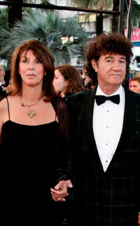 Robert Charlebois and Guest at the premiere of "Joyeux Noel" during the 58th International Cannes Film Festival in France.