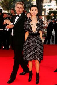 Maggie Cheung and Orhan Pamuk at the premiere of "No Country For Old Men" at the Palais des Festivals during the 60th International Cannes Film Festival.