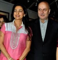 Juhi Chawla and Anupam Kher at the inauguration of artist Geeta Dass's exhibition of paintings.