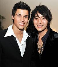 Taylor Lautner and Justin Chon at the after party of the premiere of "Twilight."