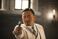 Yun-Fat Chow as Master Huang in ``Let the Bullets Fly.''