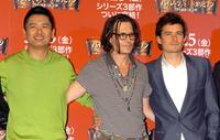 Chow Yun-Fat, Johnny Depp and Orlando Bloom at Tokyo the photocall to promote "Pirates Of The Caribbean: At World's End".