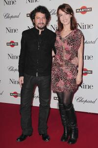 Radu Mihaileanu and Dolores Chaplin at the premiere of "Nine."