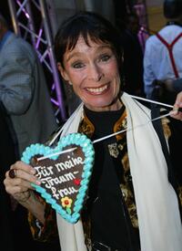 Geraldine Chaplin at the Hoffest party wears a heart that reads "For my Dream Woman".